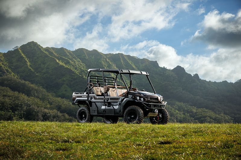 a truck with a mountain in the background